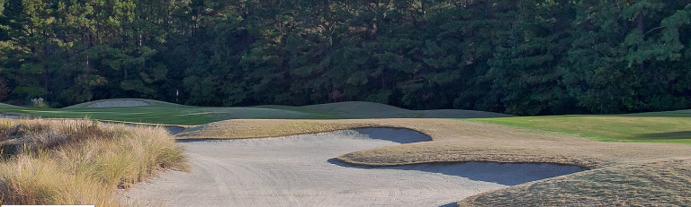 Image: Large sand trap on beautiful fairway