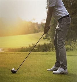 Golfer Prepares To Tee Off Image: Golfer prepating to tee off