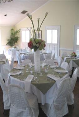 Image: formal dinnig room with table settings.