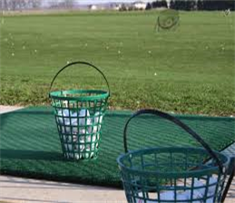 Ball baskets on golf practice tee