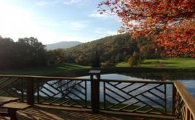 Image: Mountain Aire Golf Club clubhouse deck overlooking pond